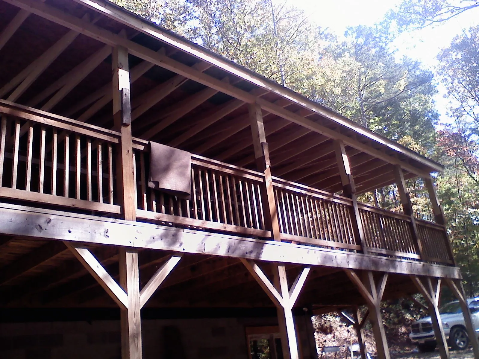 Timber framing under a new elevated porch and deck — Roof Leak Repair in Saint Johnsbury by Roofing Brothers
